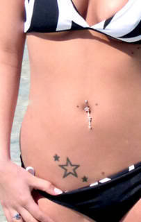 Star Tattoo On Stomach